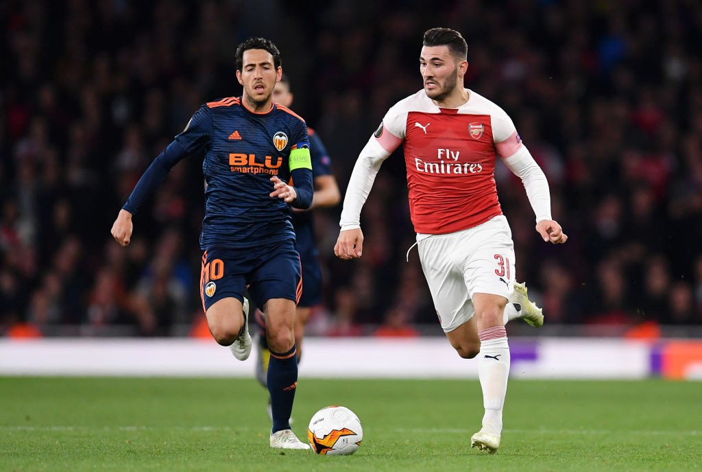 LONDON, ENGLAND - MAY 02: Daniel Parejo of Valencia battles for possession with Sead Kolasinac of Arsenal during the UEFA Europa League Semi Final ...