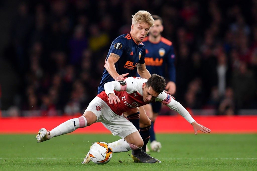 Player ratings vs Valencia: Arsenal achieve positive result despite early setback 5 LONDON, ENGLAND - MAY 02: Daniel Wass of Valencia tackles Lucas Torreira of Arsenal during the UEFA Europa League Semi Final First Leg match between Arsenal and Valencia at Emirates Stadium on May 2, 2019 in London, England. (Photo by Justin Setterfield/Getty Images,)