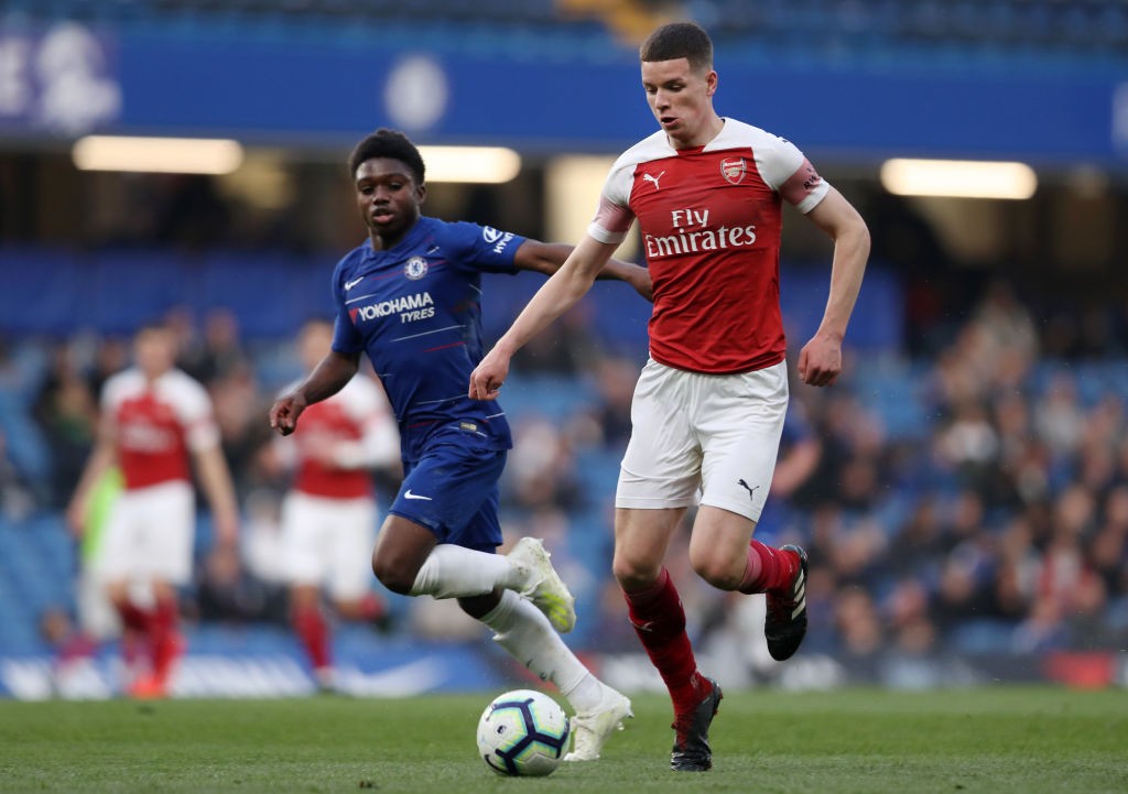 LONDON, ENGLAND - APRIL 15: Charlie Gilmour of Arsenal controls the ball as Tariq Lamptey of Chelsea looks on during the Premier League 2 match bet...