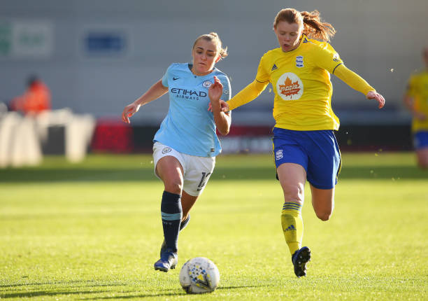 MANCHESTER, ENGLAND - DECEMBER 09: Georgia Stanway of Manchester City Women and Meaghan Sargeant of Birmingham City Women compete for the ball duri...