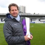 BOREHAMWOOD, ENGLAND - MAY 11: Joe Montemurro manager / head coach of Arsenal celebrates with the trophy after the WSL match between Arsenal Women and Manchester City at Meadow Park on May 11, 2019 in Borehamwood, England. (Photo by Catherine Ivill/Getty Images)