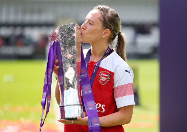 BOREHAMWOOD, ENGLAND - MAY 11: Jordan Nobbs of Arsenal celebrates with the Women's Super League trophy after the WSL match between Arsenal Women an...