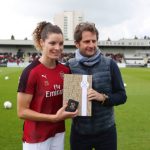 BOREHAMWOOD, ENGLAND - MAY 11: Dominique Bloodworth of Arsenal receives an award for 100 appearances from Joe Montemurro manager / head coach of Arsenal ahead the WSL match between Arsenal Women and Manchester City at Meadow Park on May 11, 2019 in Borehamwood, England. (Photo by Catherine Ivill/Getty Images)