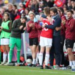 BOREHAMWOOD, ENGLAND - MAY 11: Dominque Bloodworth of Arsenal is embraced by Joe Montemurro manager of Arsenal during the WSL match between Arsenal Women and Manchester City Women at Meadow Park on May 11, 2019 in Borehamwood, England. (Photo by Catherine Ivill/Getty Images)