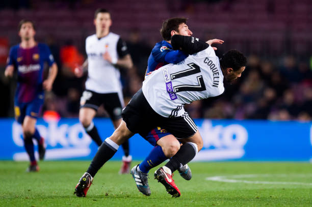 Francis Coquelin has no Arsenal regrets 2 BARCELONA, SPAIN - FEBRUARY 01: Lionel Messi of FC Barcelona clashes with Francis Coquelin of Valencia CF during the Copa del Rey semi-final first leg match between FC Barcelona and Valencia CF at Camp Nou on February 1, 2018 in Barcelona, Spain. (Photo by Alex Caparros/Getty Images)