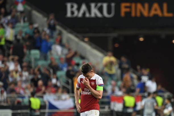 Arsenal's French defender Laurent Koscielny reacts after losing during the UEFA Europa League final football match between Chelsea FC and Arsenal F...
