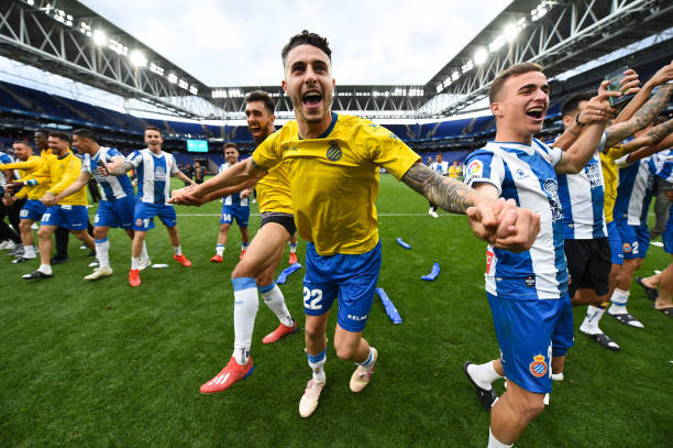BARCELONA, SPAIN - MAY 18: Mario Hermoso of RCD Espanyol celebrates with his team mates winning a UEF Europa League position next season at the end...