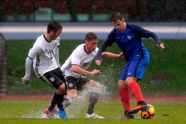 VILA REAL SANTO ANTÓNIO, PORTUGAL - FEBRUARY 11: Erkan Eyibil and Oliver Batista-Meier (L) of Germany U16 challenge Bilel Hassaini (R) of France U1...
