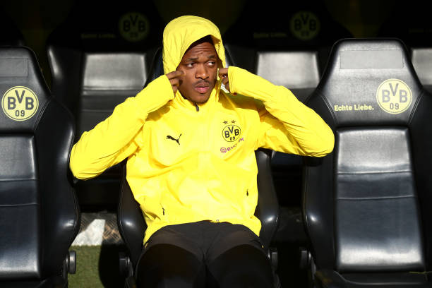 DORTMUND, GERMANY - APRIL 13: Dan-Axel Zagadou of Borussia Dortmund looks on from the bench prior to the Bundesliga match between Borussia Dortmund...
