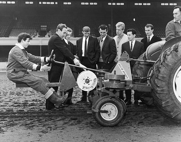 Former Arsenal star Alan Skirton dies 3 Arsenal players watching GEC workers install under-soil heating cables under the pitch at the stadium in Highbury, North London, 24th April 1964. From left to right, Billy Wright, George Eastham, Billy McCullough, Alan Skirton, Ian Ure, Johnny McLeod and Jim Magill. (Photo by George W. Hales/Fox Photos/Getty Images)