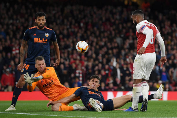 Arsenal and Chelsea want unwanted Barcelona Brazilian 2 LONDON, ENGLAND - MAY 02: Alexandre Lacazette of Arsenal has his shot blocked by Norberto Murara Neto and Gabriel Paulista of Valencia during the UEFA Europa League Semi Final First Leg match between Arsenal and Valencia at Emirates Stadium on May 02, 2019 in London, England. (Photo by Shaun Botterill/Getty Images)