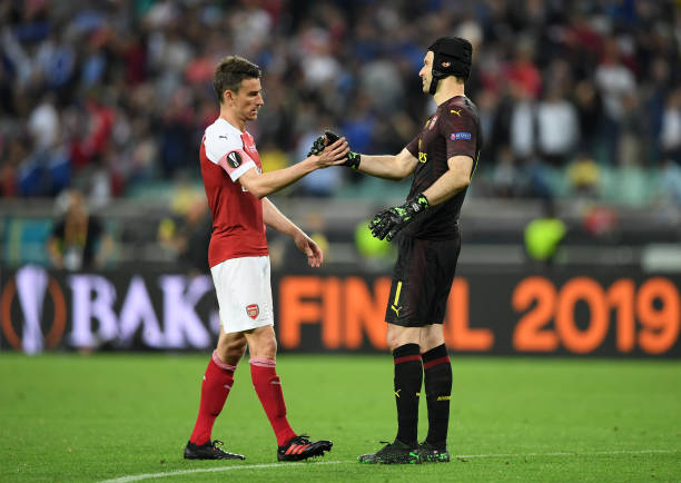 BAKU, AZERBAIJAN - MAY 29: Laurent Koscielny of Arsenal and Petr Cech of Arsenal shake hands after the UEFA Europa League Final between Chelsea and Arsenal at Baku Olimpiya Stadionu on May 29, 2019 in Baku, Azerbaijan. (Photo by Michael Regan/Getty Images)