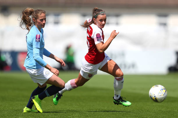 Arsenal star proud to use 'platform to speak up' for LGBTQ community 2 BOREHAMWOOD, ENGLAND - MAY 11: Katie McCabe of Arsenal battles for possession with Janine Beckie of Manchester City Women during the WSL match between Arsenal Women and Manchester City Women at Meadow Park on May 11, 2019 in Borehamwood, England. (Photo by Catherine Ivill/Getty Images)