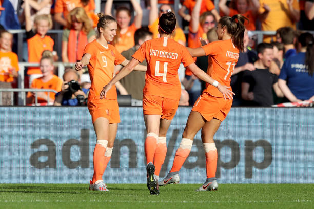 EINDHOVEN, NETHERLANDS - JUNE 01: Vivianne Miedema of Netherlands (L) celebrates the second goal with Merel van Dongen (C) and Lieke Martens (R) du...