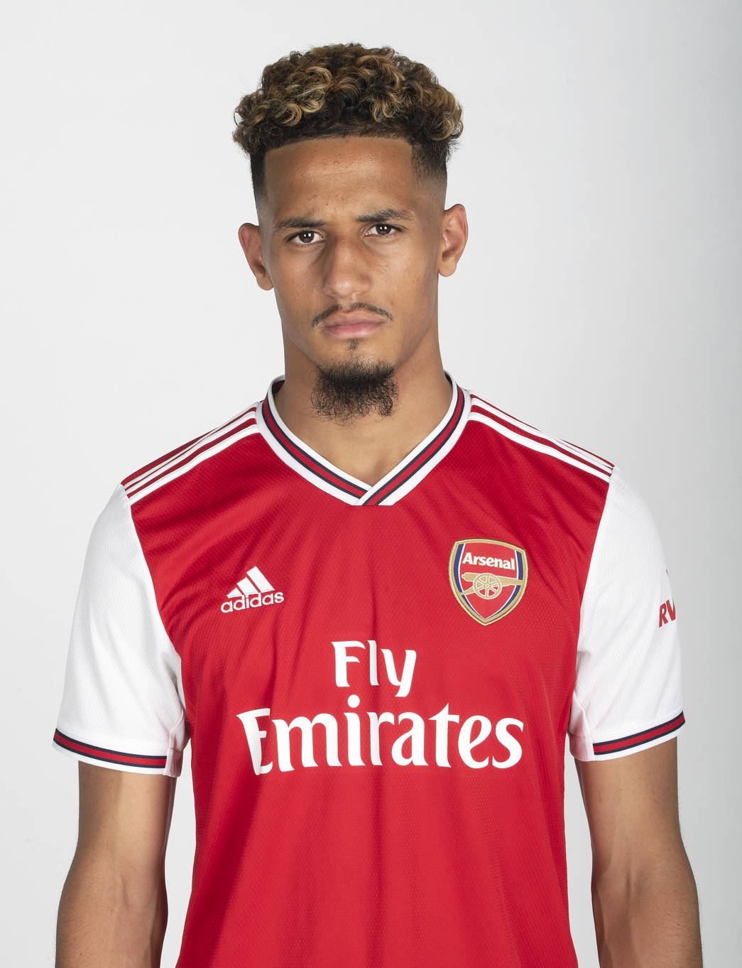 William Saliba after signing for Arsenal from St. Etienne (Photo via Arsenal.com)