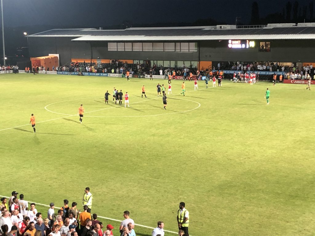 Arsenal and Barnet players at the final whistle