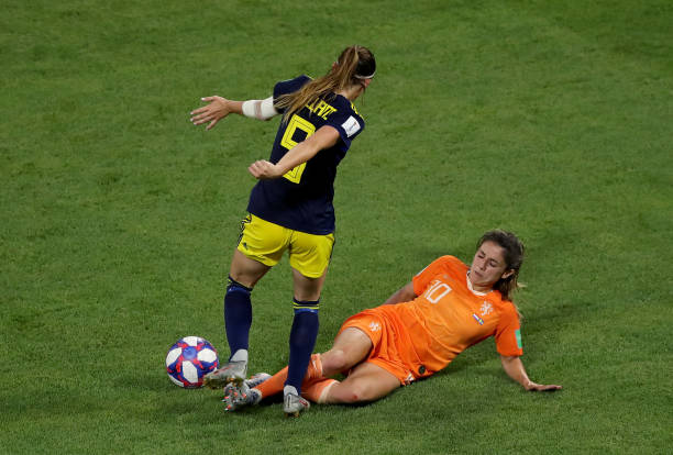LYON, FRANCE - JULY 03: Kosovare Asllani of Sweden is challenged by Danielle Van De Donk of the Netherlands during the 2019 FIFA Women's World Cup France Semi Final match between Netherlands and Sweden at Stade de Lyon on July 03, 2019 in Lyon, France. (Photo by Elsa/Getty Images)