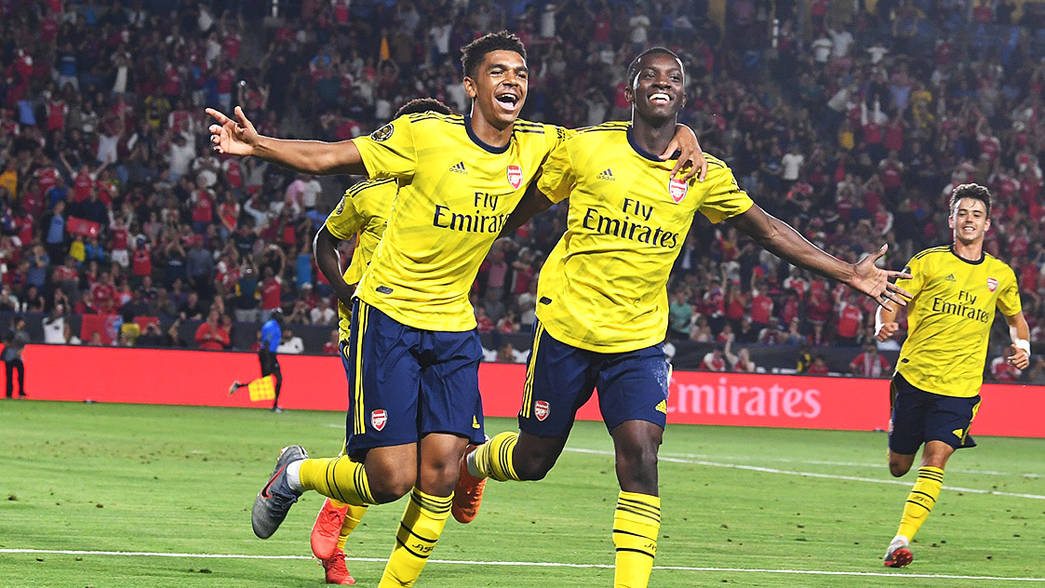 Tyreece John-Jules and Eddie Nketiah celebrating Nketiah's winner against Bayern Munich in pre-season (Photo via Arsenal.com)