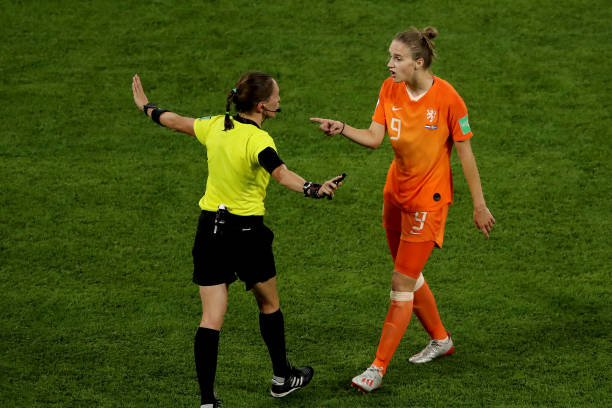 LYON, FRANCE - JULY 03: Referee Marie-Soleil Beaudoin talks to Vivianne Miedema of the Netherlands during the 2019 FIFA Women's World Cup France Se...