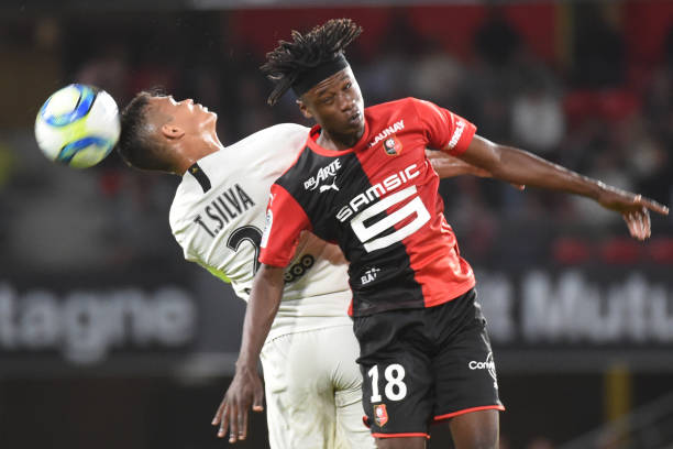 Rennes' French midfielder Eduardo Camavinga (R) heads the ball during the French L1 football match between Rennes (SRFC) and Paris Saint-Germain (P...