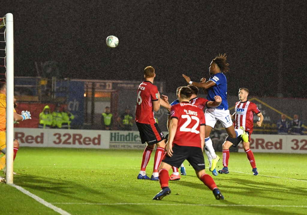 LINCOLN, ENGLAND - AUGUST 28: Alex Iwobi of Everton scores his team's third goal during the Carabao Cup Second Round match between Lincoln City and...