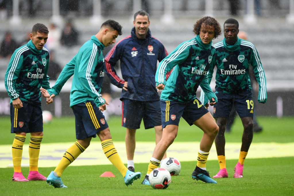 Lucas Torreira's agent admits AC Milan did try to sign him but Arsenal refused 2 NEWCASTLE UPON TYNE, ENGLAND - AUGUST 11: David Luiz of Arsenal warms up with team mates Lucas Torreira, Gabriel Martinelli and Nicolas Pepe ahead of the Premier League match between Newcastle United and Arsenal FC at St. James Park on August 11, 2019, in Newcastle upon Tyne, United Kingdom. (Photo by Stu Forster/Getty Images)