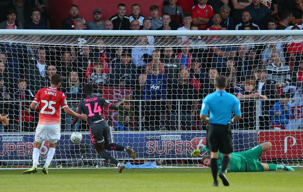 SALFORD, ENGLAND - AUGUST 13: Eddie Nketiah of Leeds United scores the opening goal during the Carabao Cup First Round match between Salford City a...