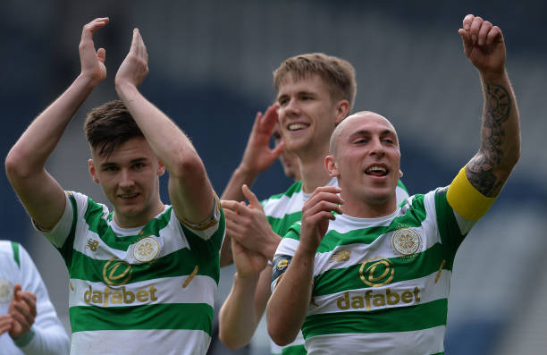 GLASGOW, SCOTLAND - APRIL 15: Scott Brown (R), and Kieran Tierney of Celtic celebrates at the final whistle as Celtic beat Rangers 4-0 during the Scottish Cup Semi Final match between Rangers and Celtic at Hampden Park on April 15, 2018 in Glasgow, Scotland. (Photo by Mark Runnacles/Getty Images)
