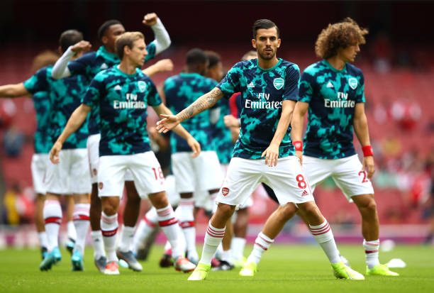 Dani Ceballos v Burnley: His MotM stats 2 LONDON, ENGLAND - AUGUST 17: Dani Ceballos of Arsenal and his team mates warm up ahead of the Premier League match between Arsenal FC and Burnley FC at Emirates Stadium on August 17, 2019 in London, United Kingdom. (Photo by Julian Finney/Getty Images)