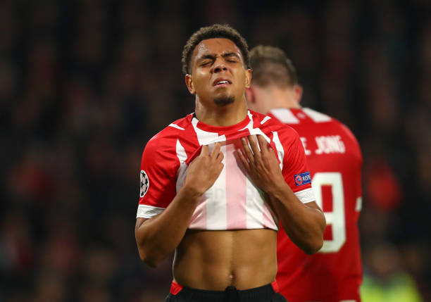 EINDHOVEN, NETHERLANDS - NOVEMBER 28: Donyell Malen of PSV Eindhoven reacts at the full time whistle after the UEFA Champions League Group B match ...