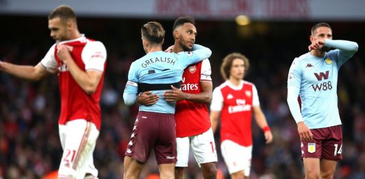 LONDON, ENGLAND - SEPTEMBER 22: Pierre-Emerick Aubameyang of Arsenal hugs Jack Grealish of Aston Villa after the Premier League match between Arsenal FC and Aston Villa at Emirates Stadium on September 22, 2019, in London, United Kingdom. (Photo by Steve Bardens/Getty Images)