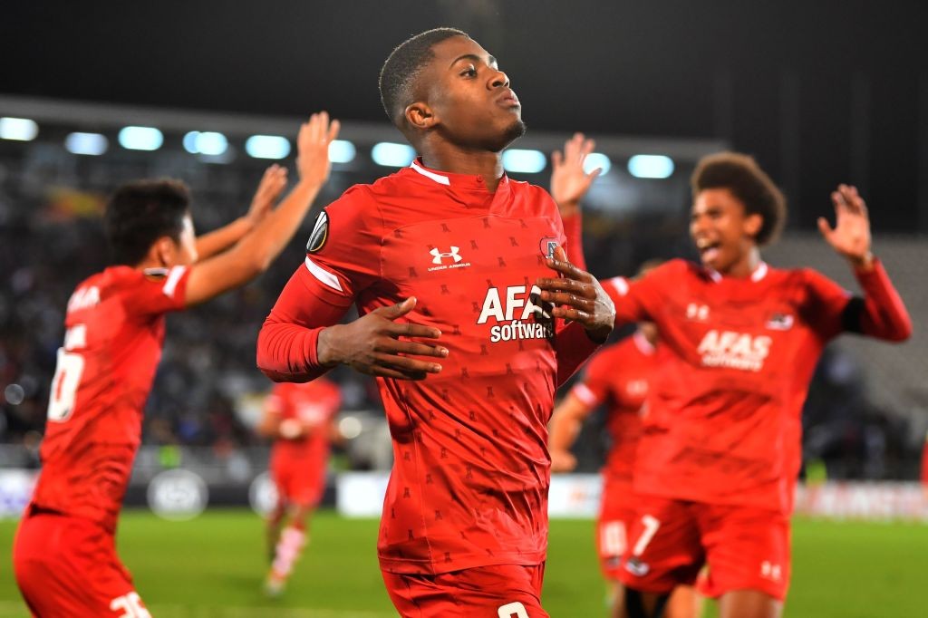 AZ Alkmaar's Dutch forward Myron Boadu (C) celebrates after scoring a goal during the UEFA Europa league group L football match between Partizan Be...