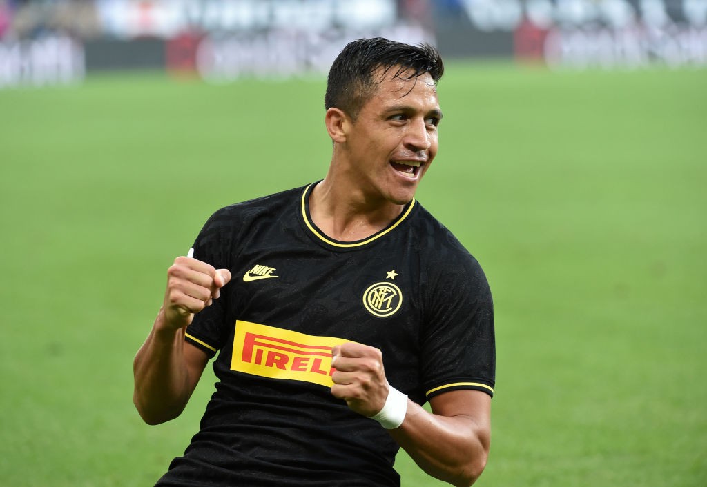 GENOA, ITALY - SEPTEMBER 28: Alexis Sanchez of FC Internazionale celebrates after scoring the first goal of his team during the Serie A match betwe...