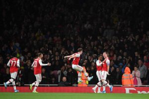 LONDON, ENGLAND - SEPTEMBER 24: Rob Holding of Arsenal celebrates scoring his teams second goal of the game with team mates during the Carabao Cup Third Round match between Arsenal FC and Nottingham Forrest at Emirates Stadium on September 24, 2019 in London, England. (Photo by Laurence Griffiths/Getty Images)