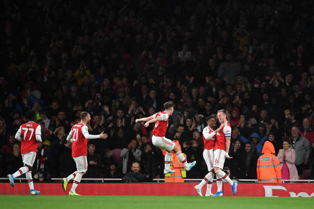 Rob Holding talks about the rival players that helped him through his injury 3 LONDON, ENGLAND - SEPTEMBER 24: Rob Holding of Arsenal celebrates scoring his teams second goal of the game with team mates during the Carabao Cup Third Round match between Arsenal FC and Nottingham Forrest at Emirates Stadium on September 24, 2019 in London, England. (Photo by Laurence Griffiths/Getty Images)