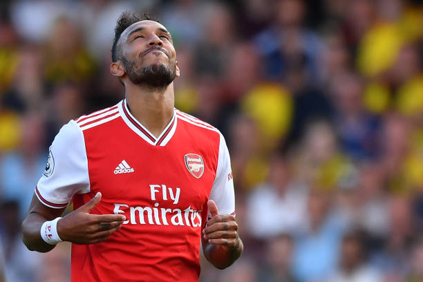 Arsenal's Gabonese striker Pierre-Emerick Aubameyang reacts to a missed chance during the English Premier League football match between Watford and...