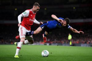 LONDON, ENGLAND - SEPTEMBER 24: Calum Chambers of Arsenal battles for the ball with Jack Robinson of Nottingham Forest during the Carabao Cup Third Round match between Arsenal FC and Nottingham Forrest at Emirates Stadium on September 24, 2019 in London, England. (Photo by Laurence Griffiths/Getty Images)