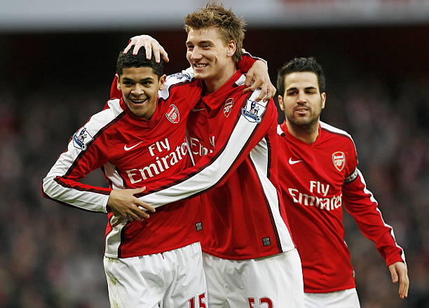 Nicklas Bendtner retires at 33 to move into coaching 2 Arsenal's Brazilian midfielder Denilson (L) celebrates scoring the opening goal with Danish striker Nicklas Bendtner (2nd L) during the English Premier League football match between Arsenal and West Ham United at the Emirates stadium, north London on March 20, 2010. AFP PHOTO/GLYN KIRK