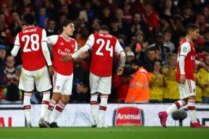 LONDON, ENGLAND - SEPTEMBER 24: Joe Willock of Arsenal celebrates scoring his team's third goal of the game with teammate Hector Bellerin during the Carabao Cup Third Round match between Arsenal FC and Nottingham Forrest at Emirates Stadium on September 24, 2019, in London, England. (Photo by Julian Finney/Getty Images)