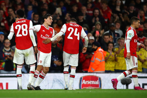 Tierney and Bellerin set for starts: Predicted Arsenal lineup vs Standard Liege 2 LONDON, ENGLAND - SEPTEMBER 24: Joe Willock of Arsenal celebrates scoring his team's third goal of the game with teammate Hector Bellerin during the Carabao Cup Third Round match between Arsenal FC and Nottingham Forrest at Emirates Stadium on September 24, 2019, in London, England. (Photo by Julian Finney/Getty Images)
