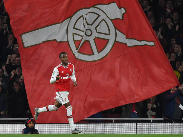 Arsenal's English midfielder Joe Willock celebrates scoring his team's third goal during the English League Cup third round football match between ...