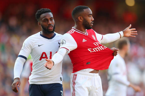 Alexandre Lacazette injury update 2 LONDON, ENGLAND - SEPTEMBER 01: Danny Rose of Tottenham Hotspur pulls the shirt of Alexandre Lacazette of Arsenal during the Premier League match between Arsenal FC and Tottenham Hotspur at Emirates Stadium on September 01, 2019 in London, United Kingdom. (Photo by Catherine Ivill/Getty Images)