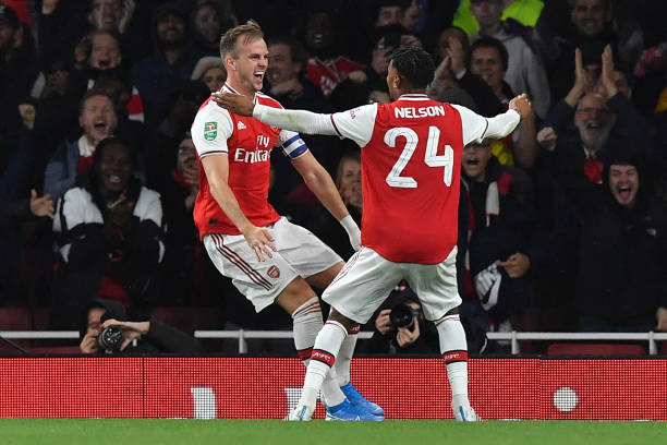 Arsenal finally confirm Rob Holding injury: Knee bruising 2 Arsenal's English defender Rob Holding (L) celebrates scoring his team's second goal during the English League Cup third round football match between Arsenal and Nottingham Forest at the Emirates Stadium in London on September 24, 2019. (Photo by Ben STANSALL / AFP)