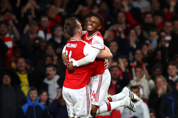 Rob Holding confirms Arsenal players voted on club captaincy 3 LONDON, ENGLAND - SEPTEMBER 24: Rob Holding of Arsenal celebrates scoring his teams second goal of the game with team mate Reiss Nelson during the Carabao Cup Third Round match between Arsenal FC and Nottingham Forrest at Emirates Stadium on September 24, 2019 in London, England. (Photo by Julian Finney/Getty Images)