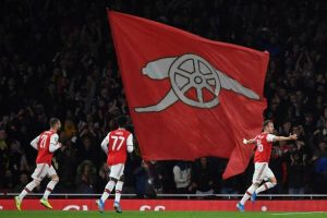 Arsenal's English defender Rob Holding (R) celebrates scoring his team's second goal during the English League Cup third round football match between Arsenal and Nottingham Forest at the Emirates Stadium in London on September 24, 2019. (Photo by Ben STANSALL / AFP)