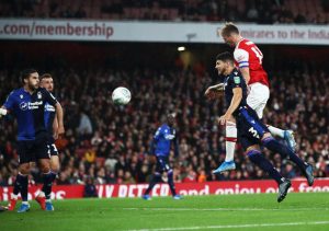 LONDON, ENGLAND - SEPTEMBER 24: Rob Holding of Arsenal scores the second goal during the Carabao Cup Third Round match between Arsenal and Nottingham Forest at Emirates Stadium on September 24, 2019 in London, England. (Photo by Julian Finney/Getty Images)