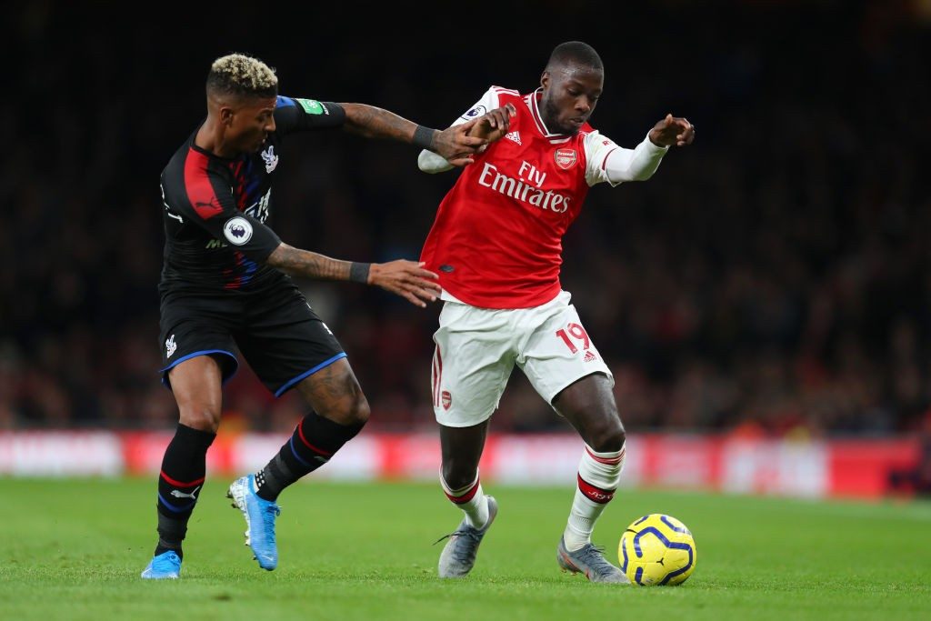 Player ratings vs Crystal Palace: Arsenal blow lead to draw in controversial circumstances 2 LONDON, ENGLAND - OCTOBER 27: Nicolas Pepe of Arsenal battles for possession with Patrick van Aanholt of Crystal Palace during the Premier League match between Arsenal FC and Crystal Palace at Emirates Stadium on October 27, 2019, in London, United Kingdom. (Photo by Catherine Ivill/Getty Images)
