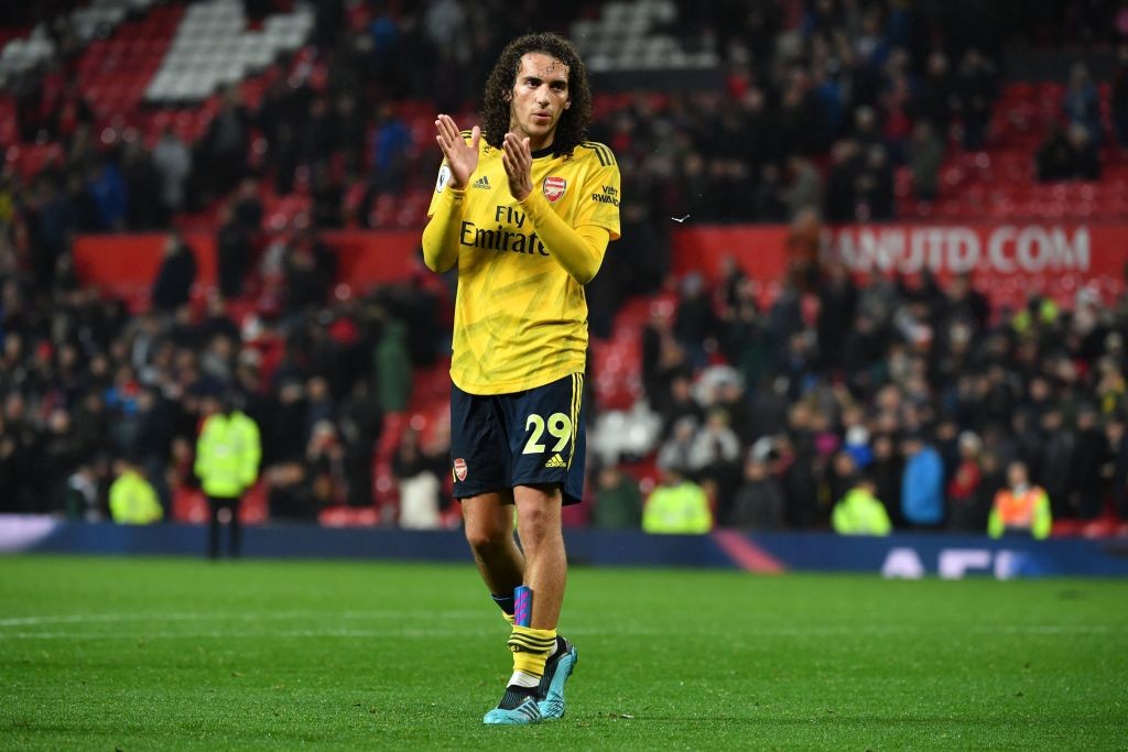 Arsenal's French midfielder Matteo Guendouzi applauds supporters on the pitch after the English Premier League football match between Manchester Un...