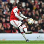 Arsenal's French-born Ivorian midfielder Nicolas Pepe takes a free-kick to scores his team's second goal during their UEFA Europa league Group F football match between Arsenal and Vitoria Guimaraes at the Emirates stadium in London on October 24, 2019. (Photo by Glyn KIRK / AFP / Getty Images)