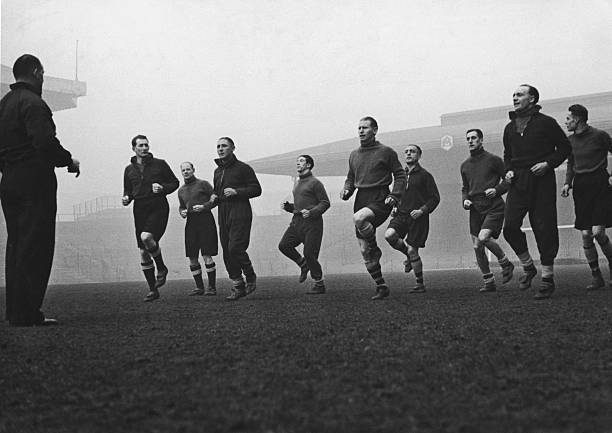 10 July, 1950: Italian national team want Arsenal manager 3 Arsenal footballers training with Tom Whittaker at the club's Highbury Stadium, late 1930s. Players include Jack Crayston, George Male, Ted Drake, Cliff Bastin, Wilf Copping and George Swindin. (Photo by Hulton Archive/Getty Images)